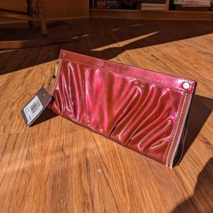 SUEDE, Patented leather, cherry red, zipper edge clutch ,NWT, spacious.